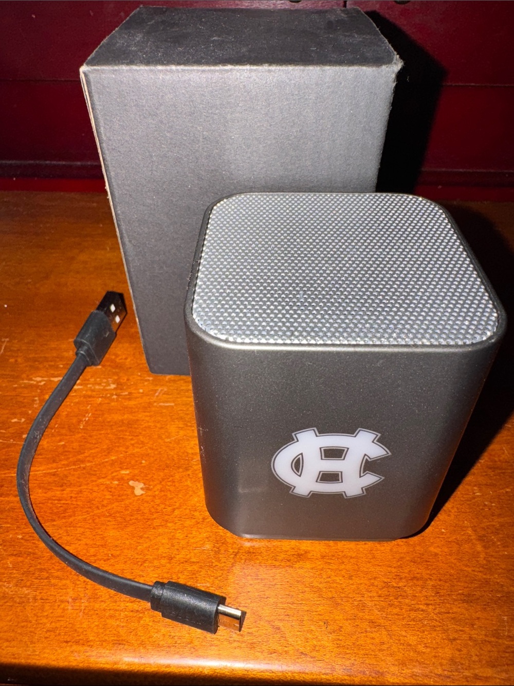 Grey Portable Bluetooth Speaker with Holy Cross Emblem